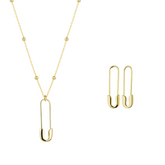 Gold safety pin necklace and earrings on a white background
