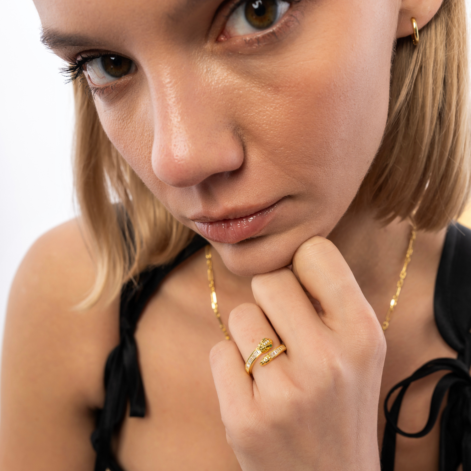Baguette Snake Ring With Green Eyes in Sterling Silver