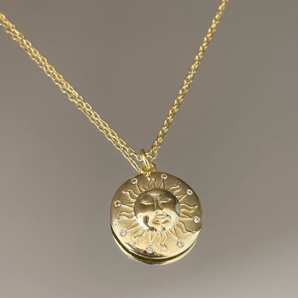 Sun Silhouette Face Embossed Sterling Silver Medal Necklace